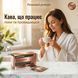 Жінка тримає чашку Quick Slim Lux Coffee вранці &mdash; ранковий beauty-ритуал з підтримкою метаболізму